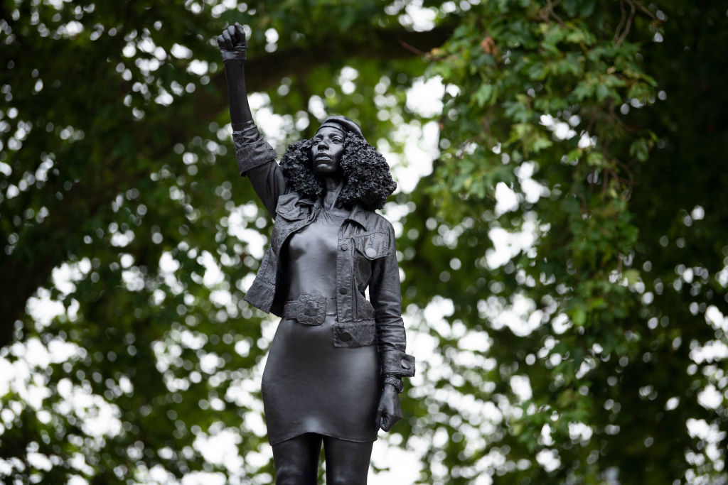 A new sculpture, by local artist Marc Quinn, of Black Lives Matter protestor Jen Reid stands on the plinth where the Edward Colston statue used to stand on July 15, 2020 in Bristol, England. Photo by Matthew Horwood/Getty Images.