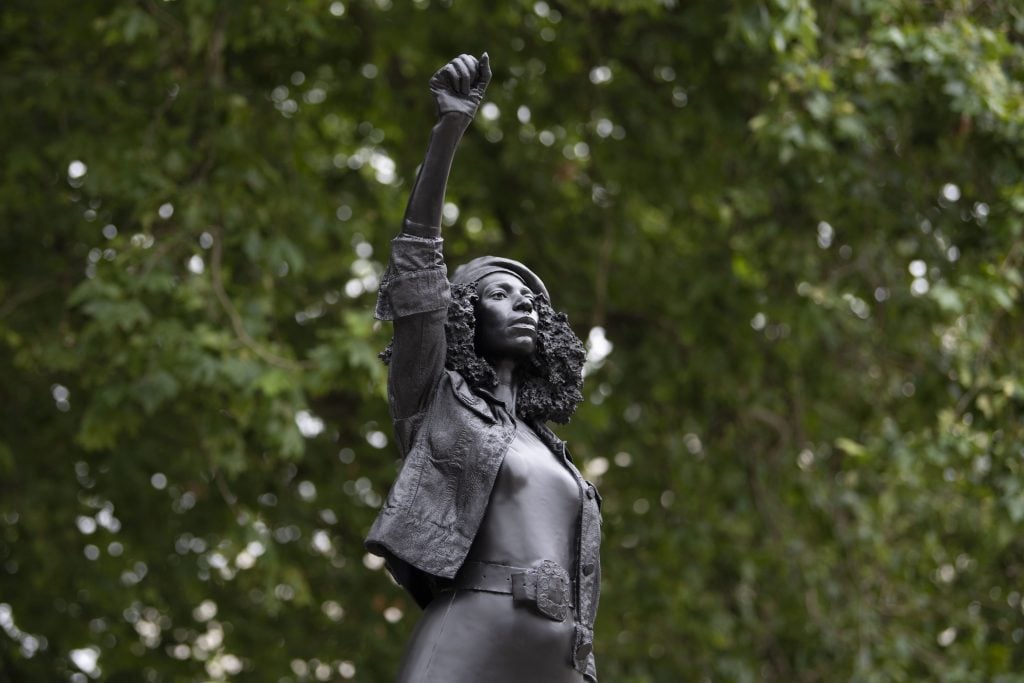 A new sculpture, by local artist Marc Quinn, of Black Lives Matter protestor Jen Reid stands on the plinth where the Edward Colston statue used to stand on July 15, 2020 in Bristol, England. Photo by Matthew Horwood/Getty Images.
