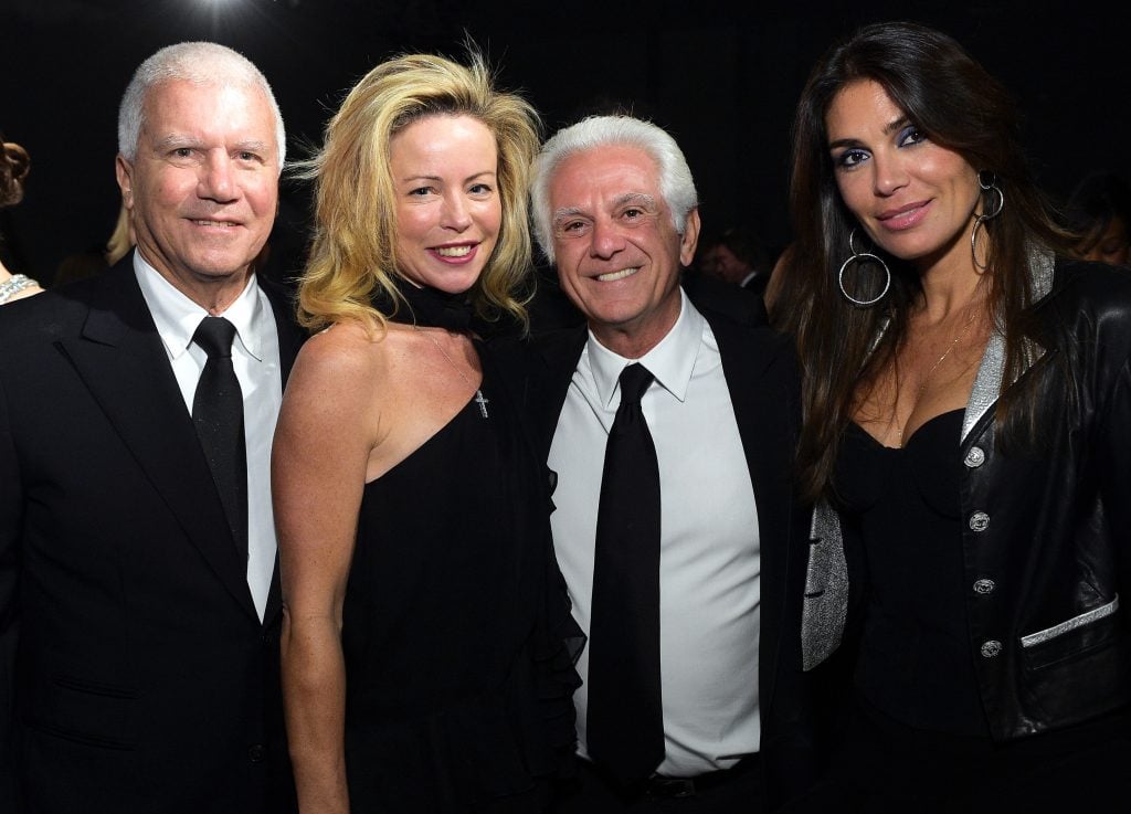Larry Gagosian, Chrissie Erph, fashion designer Maurice Marciano and guest attend the 2014 LACMA Art + Film Gala honoring Barbara Kruger and Quentin Tarantino presented by Gucci at LACMA on November 1, 2014 in Los Angeles, California. (Photo by Stefanie Keenan/Getty Images for LACMA)
