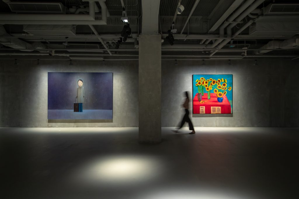 Installation view of works by Liu Ye and David Hockney. Courtesy of Sotheby's.
