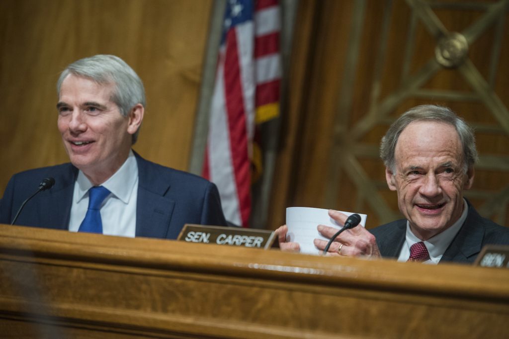 Rob Portman, Republican-Ohio (left), and Tom Carper, Democrat-Delaware, conduct a Senate Committee on Homeland Security and Governmental Affairs Permanent Subcommittee on Investigations hearing on May 25, 2017. Photo By Tom Williams/CQ Roll Call.