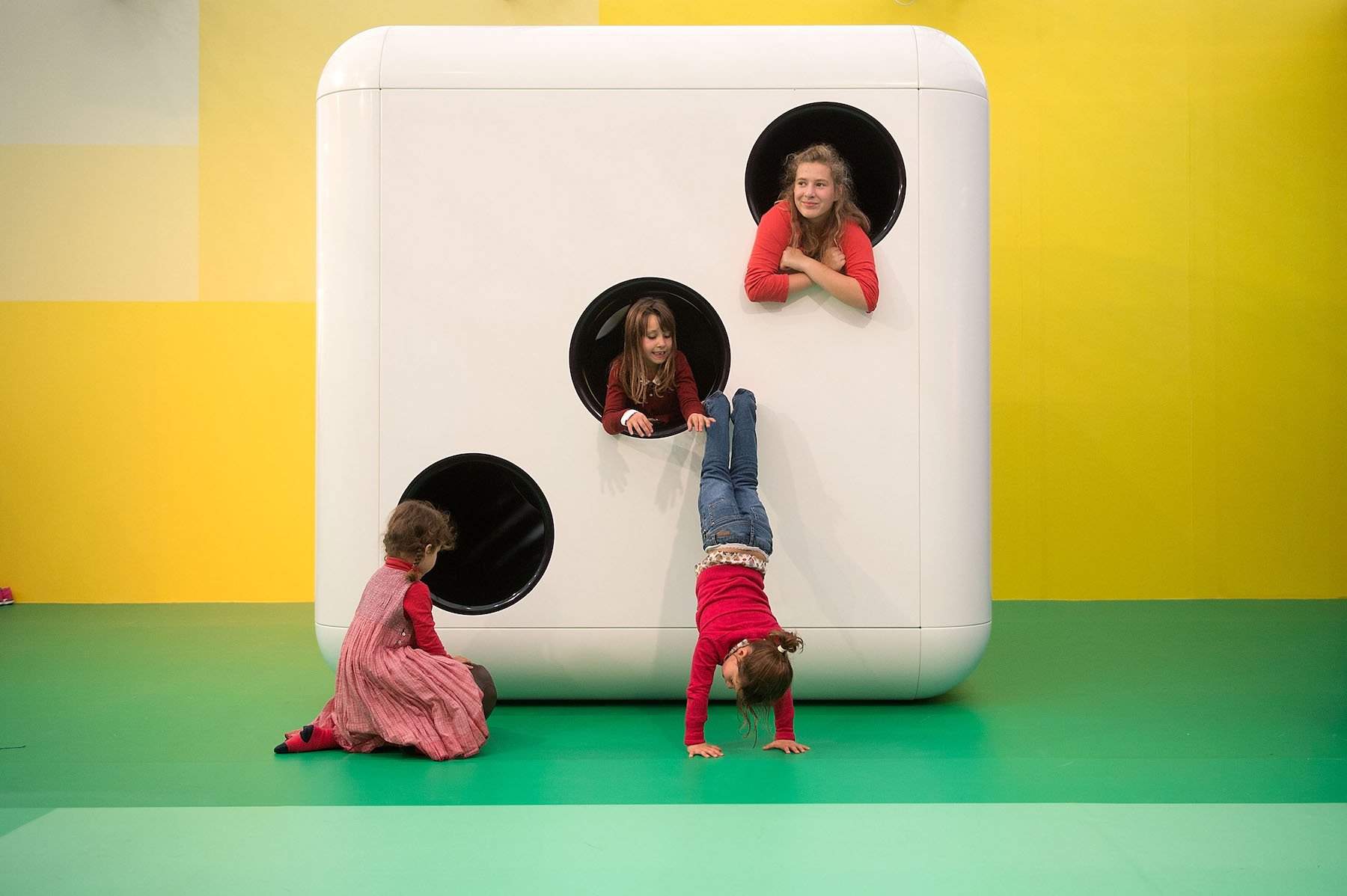 Children play on artist Carsten Holler's installation Gartenkinder, which doubles as a children's playground. Photo by Matthew Lloyd/Getty Images for Gagosian Gallery.