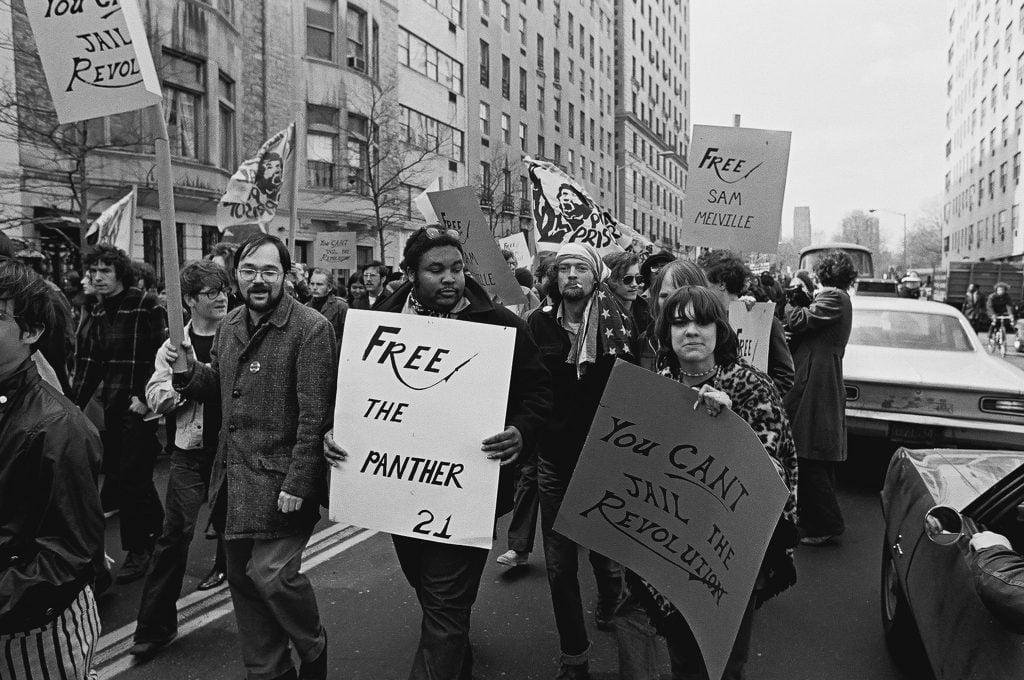 Demonstrators march in support of the Panther 21, New York, New York, April 4, 1970. The Panther 21 were Black Panther members arrested by New York police under suspicion of planning a series of bombings, charges that were eventually dropped against all the defendants. Photo by David Fenton/Getty Images.
