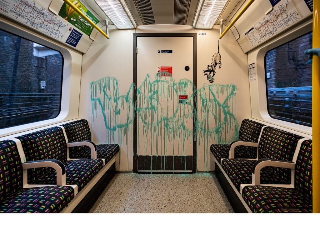 Banksy's latest artwork inside a London tube car. Courtesy Banksy.