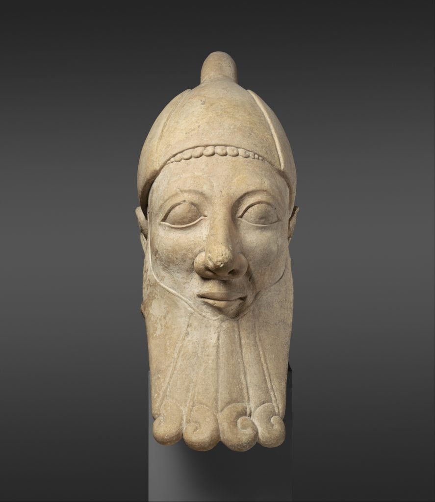 Limestone head of a bearded man, Cypriot (early 6th century BC). Photo courtesy of the Metropolitan Museum, the Cesnola Collection, Purchased by subscription, 1874–76.
