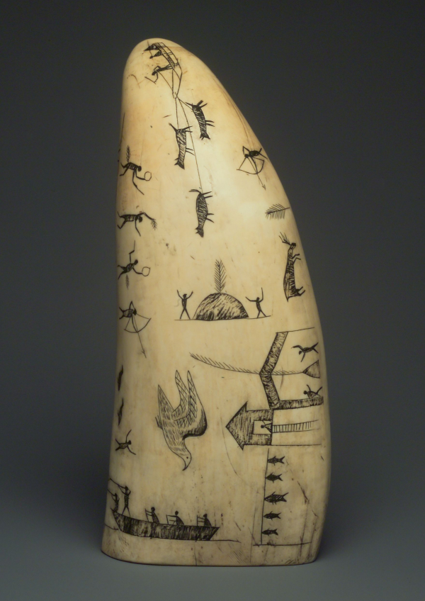 Eskimo artist, Sperm Whale Tooth Engraved With Black Ash or Graphite (late 19th century). Photo courtesy of the Brooklyn Museum.