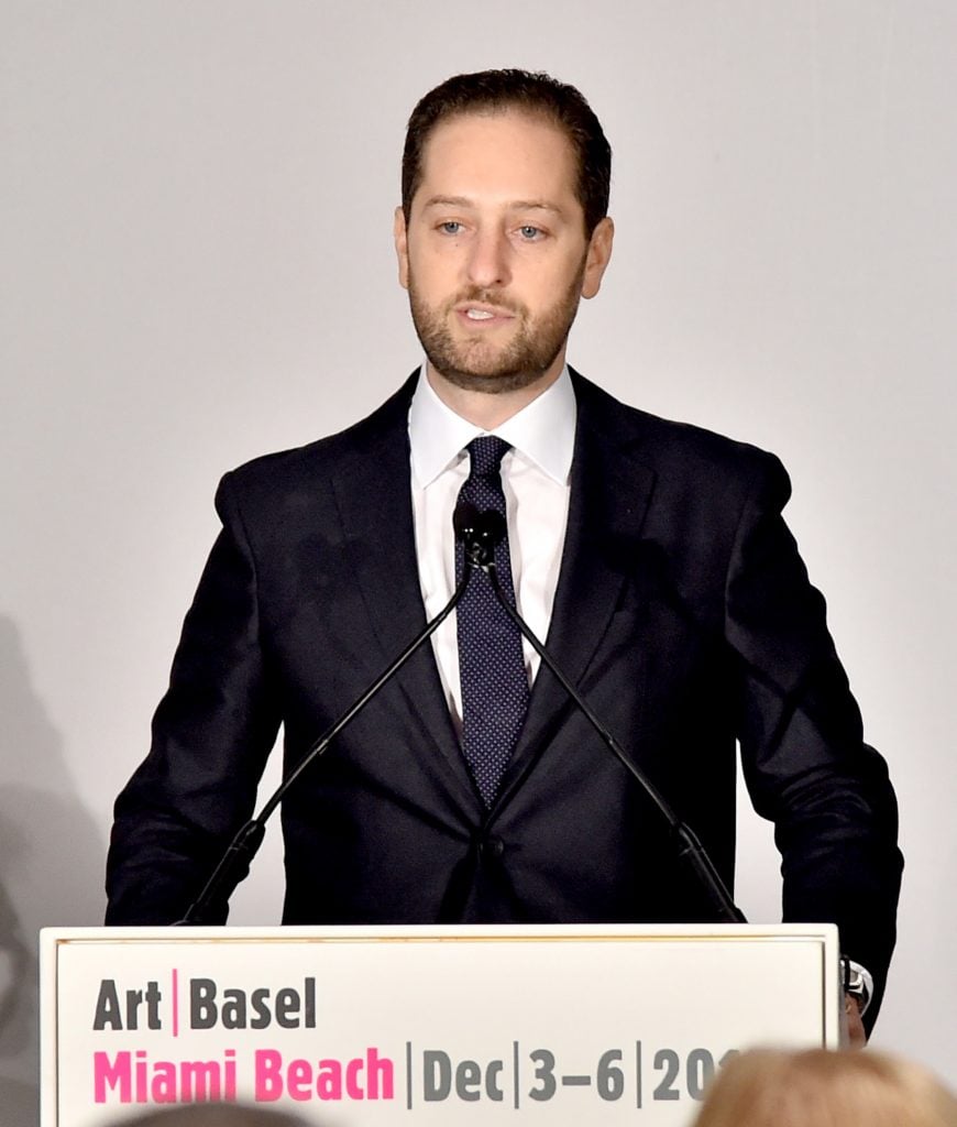 Art Basel’s Director Americas Noah Horowitz speaks onstage during the Art Basel Miami Beach press conference at the Miami Convention Center. Photo by Mike Coppola/Getty Images.