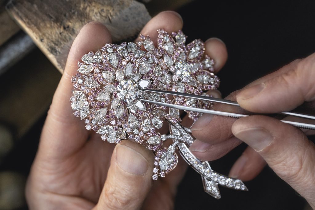 A craftsperson at work on the floral brooch. Photo courtesy Graff.