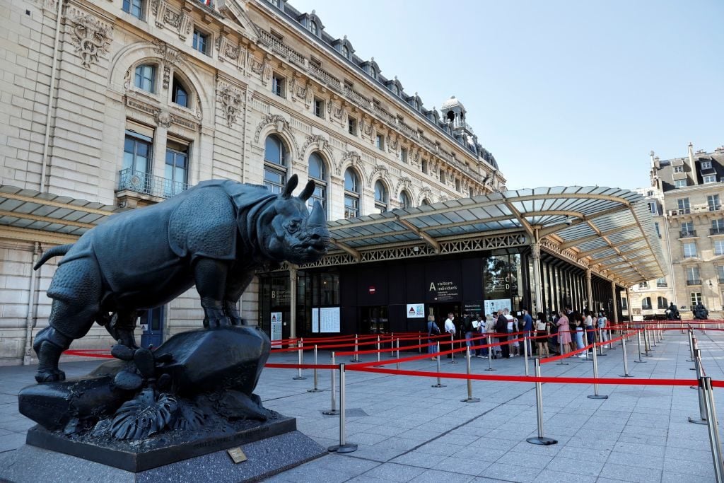 People queue outside the Orsay museum on its reopening day, on June 23, 2020. Photo by THOMAS COEX/AFP via Getty Images.