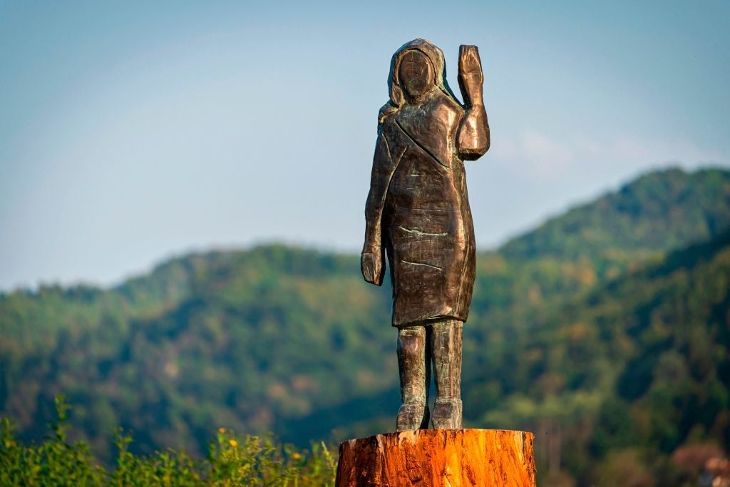 A bronze replica depicting US First Lady Melania Trump, made by US artist Brad Downey, is seen after its unveiling in a field near US First Lady's hometown Sevnica. Photo by Jure Makovec/AFP via Getty Images.