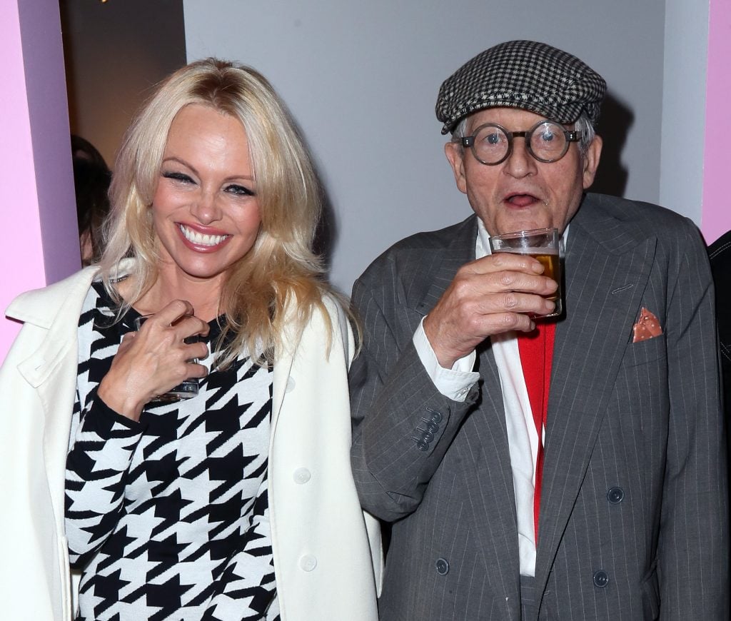 Actress Pamela Anderson and artist David Hockney attend the opening reception for David Hockney's 