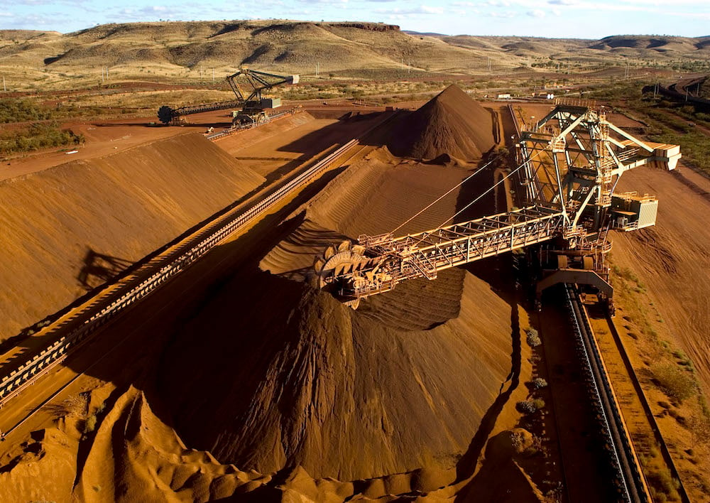 An undated handout photo released on September 4, 2009 by Rio Tinto shows a reclaimer working in the Yandicoogina stockyard and loading a conveyor with high grade iron ore in Western Australia's Pilbara region. AFP PHOTO / Christian Sprogoe. Photo: Christian Sprogoe/AFP via Getty Images.