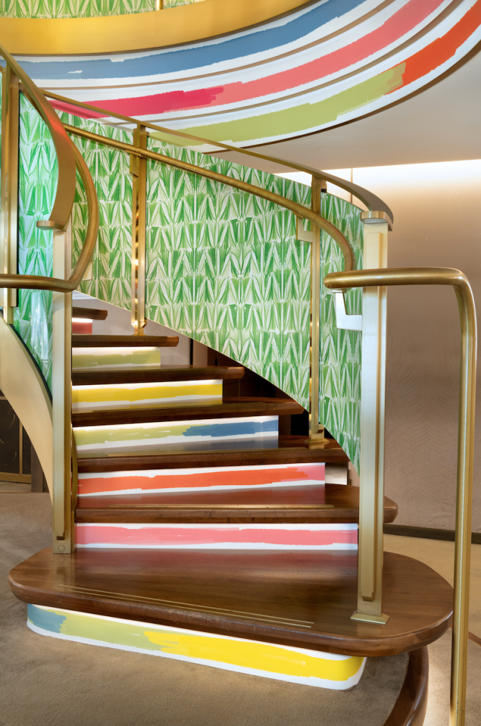 A staircase adorned with original works by Navet. Photo courtesy Ricky Zehavi.