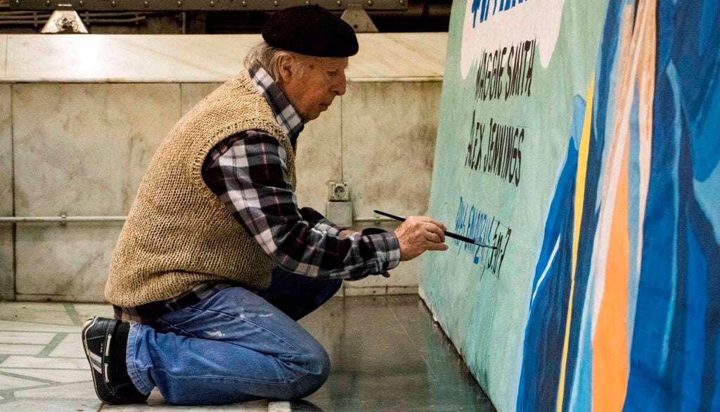 Vassilis Dimitriou creating one of his hand-painted movie poster billboards for the Athinaion cinema in Athens. Photo courtesy of the Athinaion.