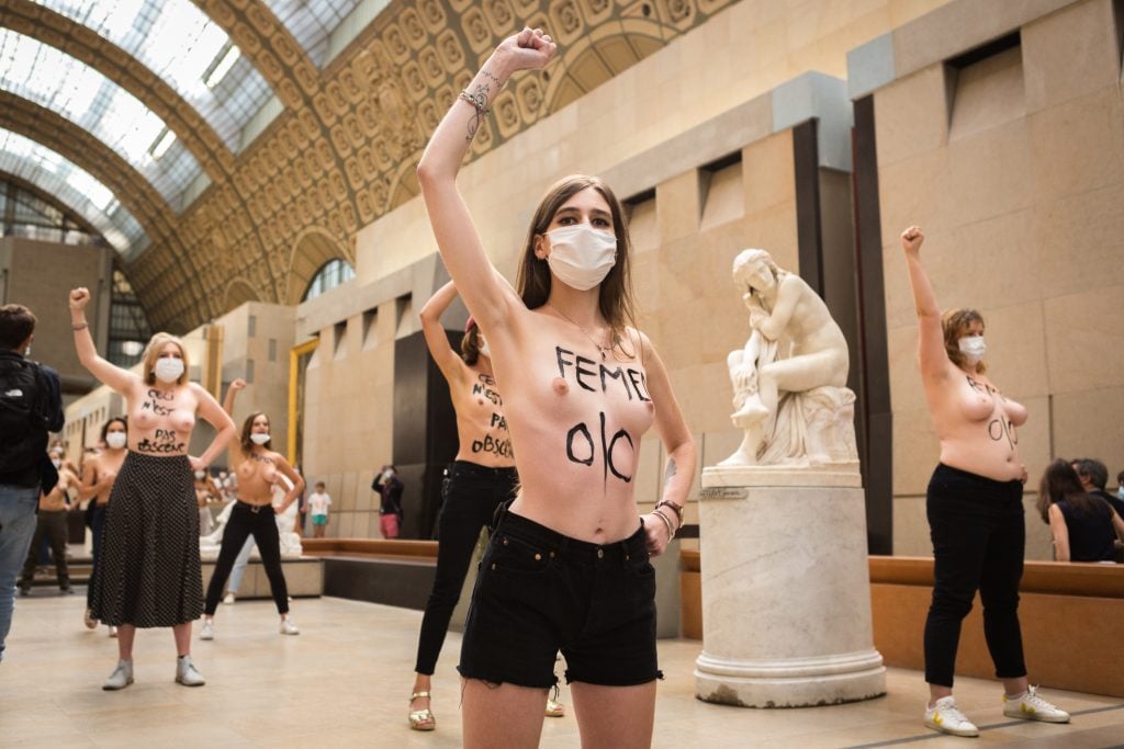 FEMEN staged a topless protest at Paris's Musée d'Orsay in response to what it views as the institution's discrimination against a woman visitor in a low-cut dress. Photo by Capucine Henry, courtesy of FEMEN.