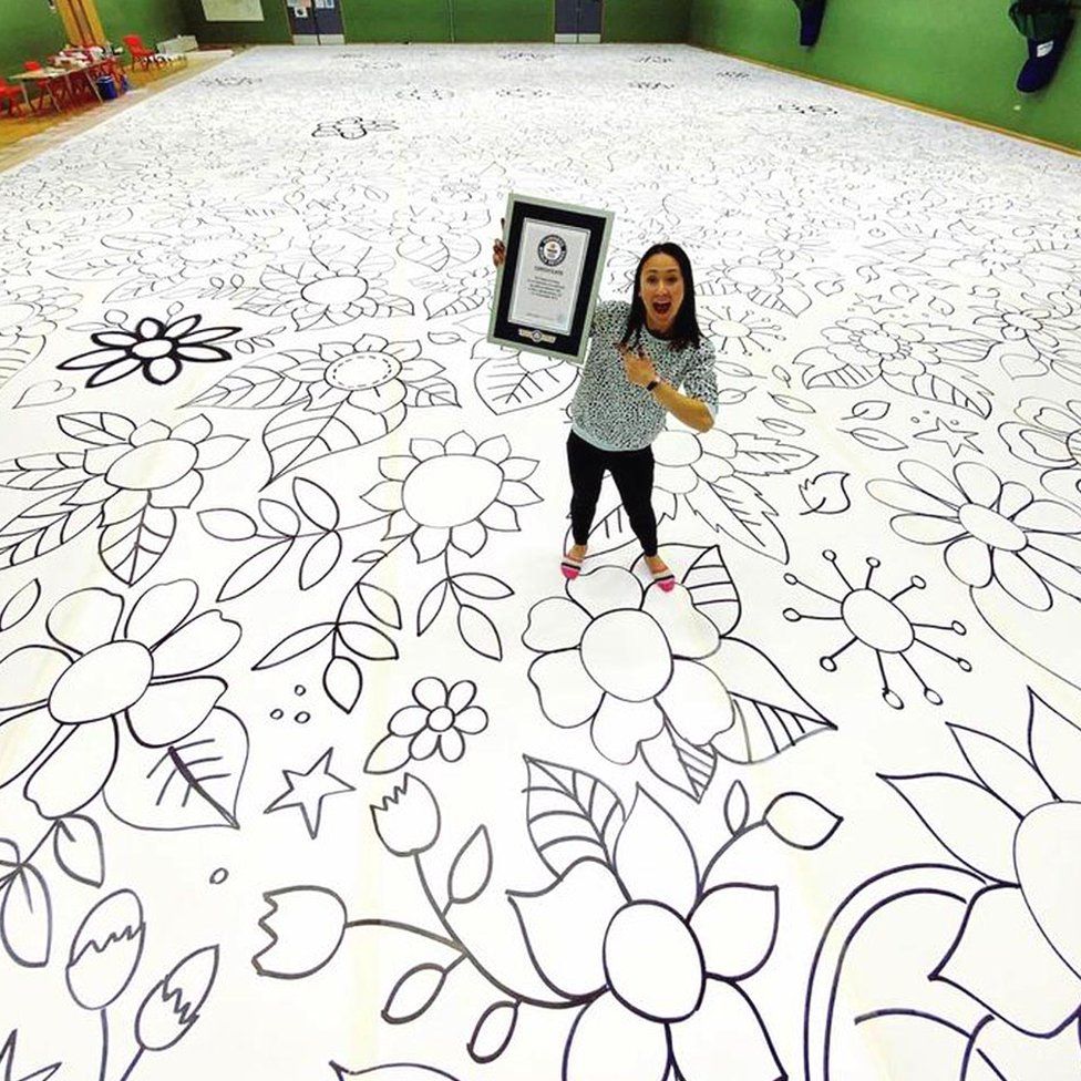 Adult coloring book artist Johanna Basford set the Guinness World Record for the largest drawing by an individual. Photo by Sam Brill, courtesy of Guinness World Records. 