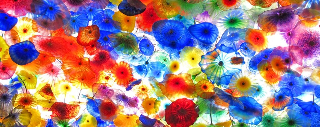 Dale Chihuly's glass sculpture, <em>Fiori di Como</eM> (1998) on the ceiling of the Bellagio in Las Vegas. Photo by torbakhopper, via Flickr Creative Commons. 