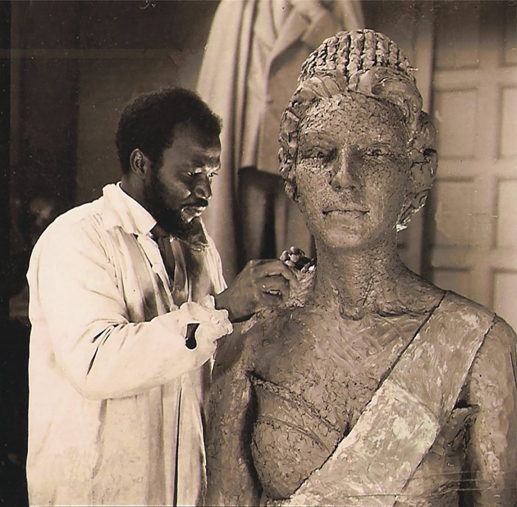 Enwonwu working on a bronze sculpture of Queen Elizabeth II. Courtesy of the Ben Enwonwu Foundation.
