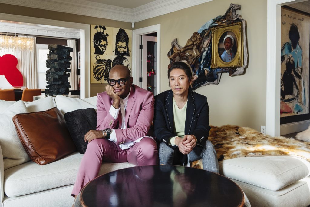 Arthur Lewis and Hao Nguyen in the living room of their Los Angeles home.