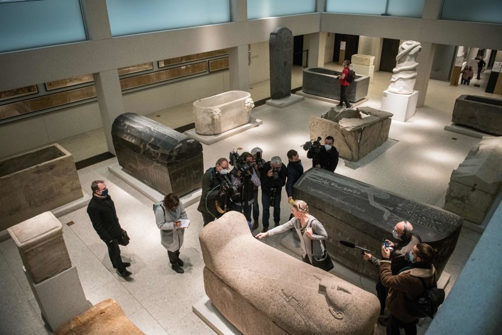 Friederike Seyfried, director of the Egyptian Museum Berlin points to the damage caused by an "oily liquid" that left visible stains on exhibits in the Egyptian part of the Neues Museum. Photo: Stefanie Loos/AFP/Getty Images.