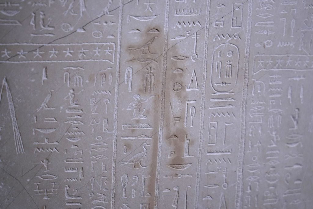 A stain left by an assailant is visible on an ancient Egyptian stone sarcophagus. Photo: Sean Gallup/Getty Images.