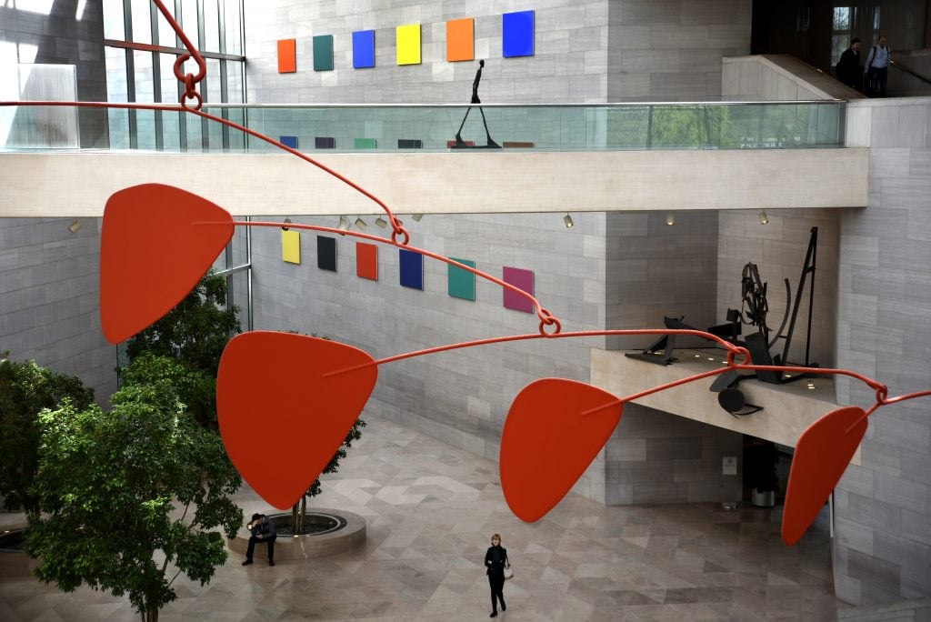 Alexander Calder's untitled aluminum and steel mobile hangs from the ceiling at the National Gallery of Art East Building on the National Mall in Washington, DC. (Photo by Robert Alexander/Getty Images)