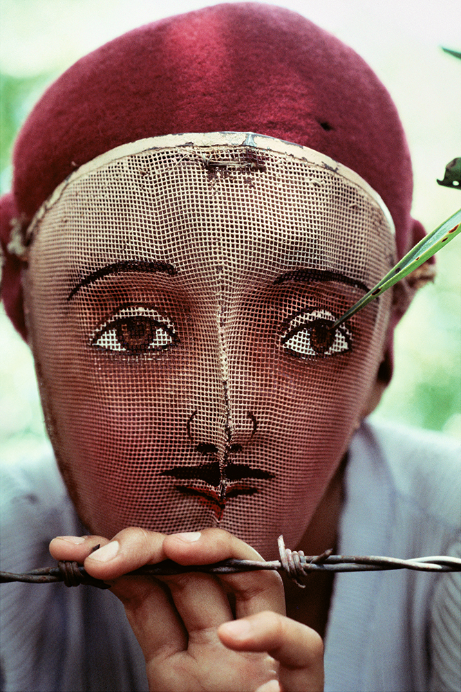 Susan Meiselas, <i>Traditional Indian dance mask from the town of Monimbo, adopted by the rebels during the fight against Somoza to conceal identity, Nicaragua</i> (1978). © Susan Meiselas/Magnum Photos.