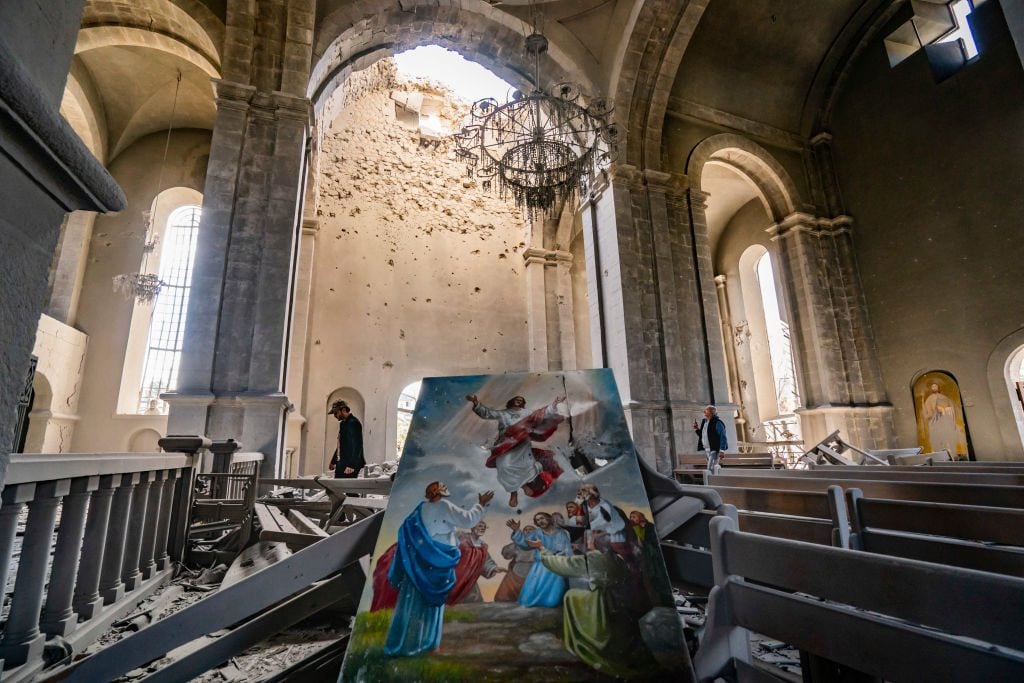 A religious destroyed painting among the destruction in the Ghazanchetsots Cathedral in Shushi, Nagorno Karabakh, after the Azerbaijan shelling in a double attack to the building on October 11, 2020. (Photo by Celestino Arce/NurPhoto via Getty Images)