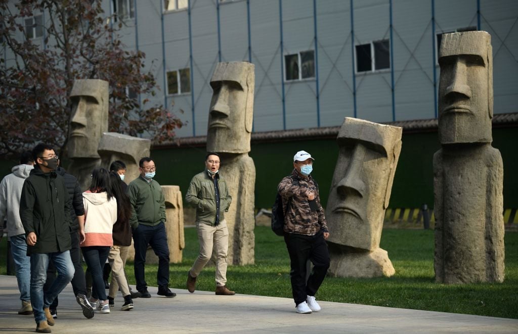 A replice of Easter Island's moʻai statues in Beijing. Photo: Noel Celis / AFP via Getty Images.