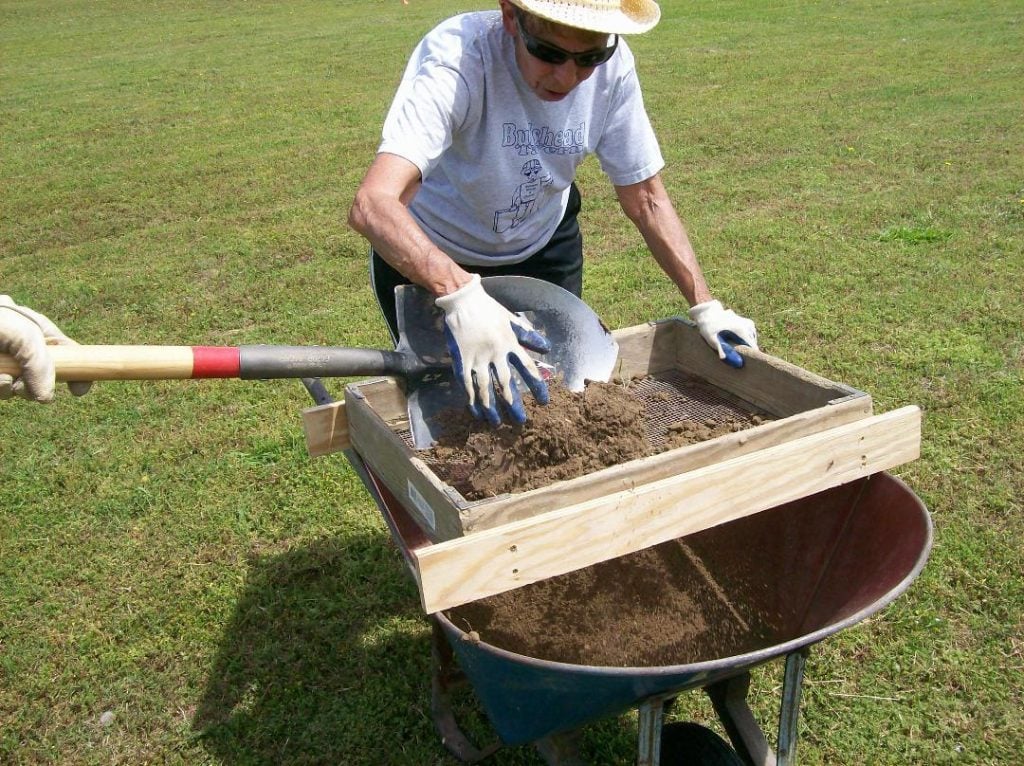 Archaeologist Martha Williams, a volunteer with the First Colony Foundation, assists with shovel testing during excavations. Photo courtesy of the First Colony Foundation.