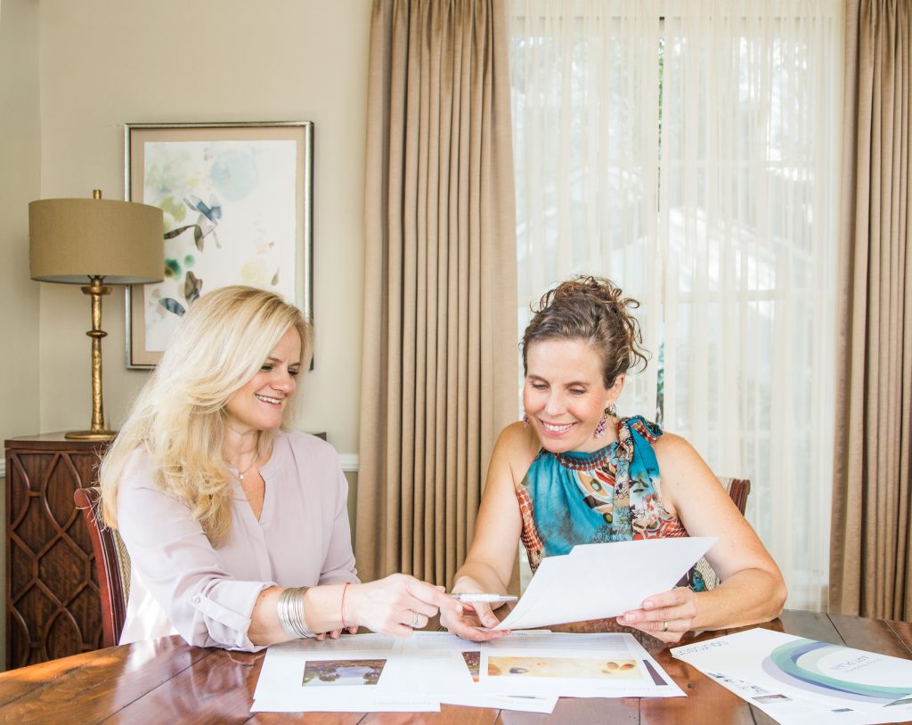 Source Art founder MaryLinda Moss (right) working with a designer. Courtesy of Source Art.