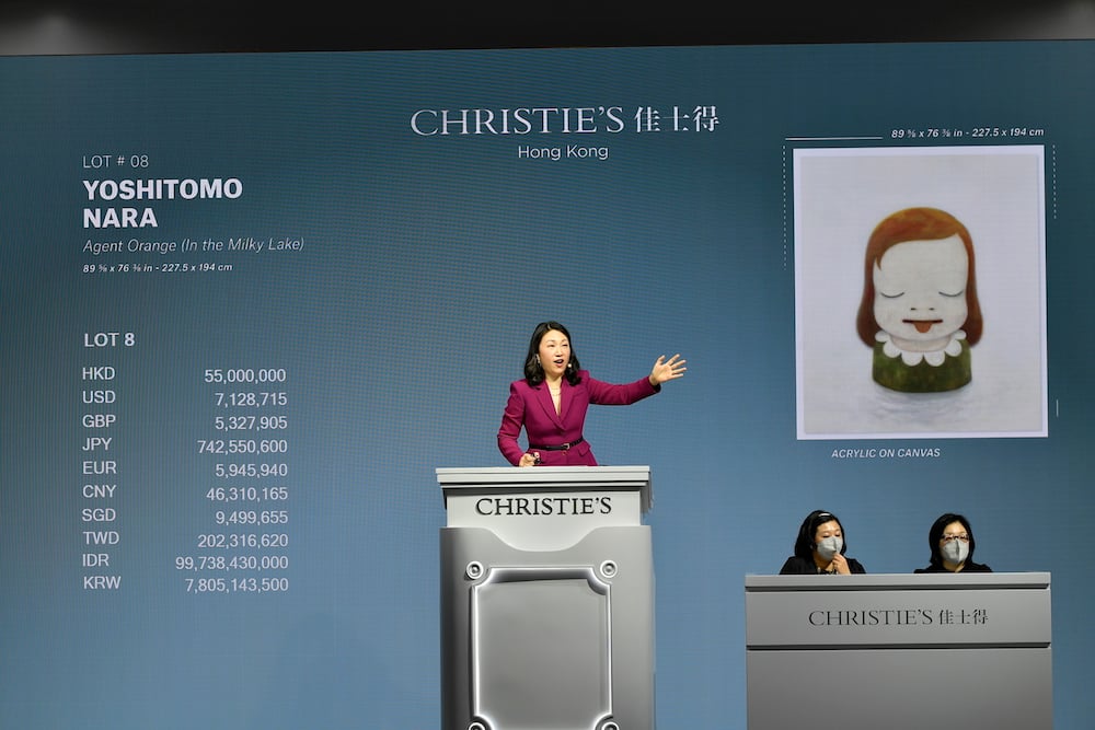 Elaine Kwok auctioneering Christie's December 2 relay sale in Hong Kong.