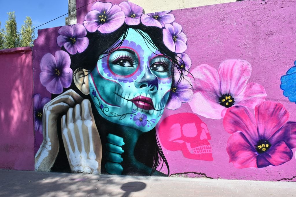 Urban artist Roberto Islas's Day of the Dead mural in memory of the victims who have lost their lives to the COVID-19 disease on October 30, 2020 in Mexico City, Mexico. Photo by Carlos Tischler/Eyepix Group/Barcroft Studios/Future Publishing via Getty Images.