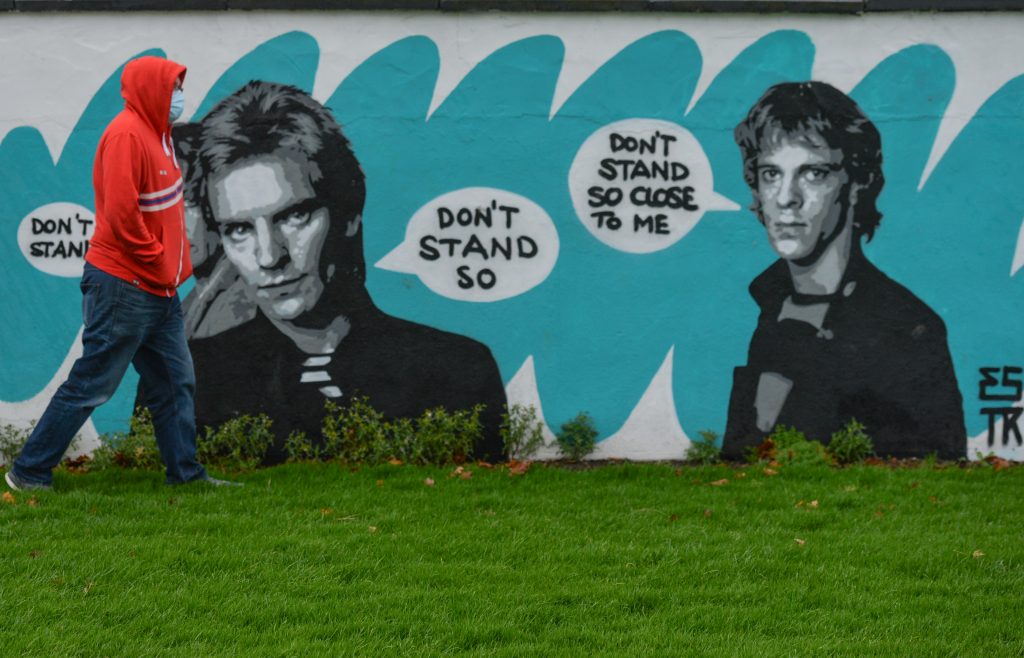 A mural of the Police, by the Irish artist Emmalene Blake, located in South Dublin. This is the latest work in her "Stay at Home" series encouraging people to stick to social distancing. Photo by Artur Widak/NurPhoto via Getty Images.