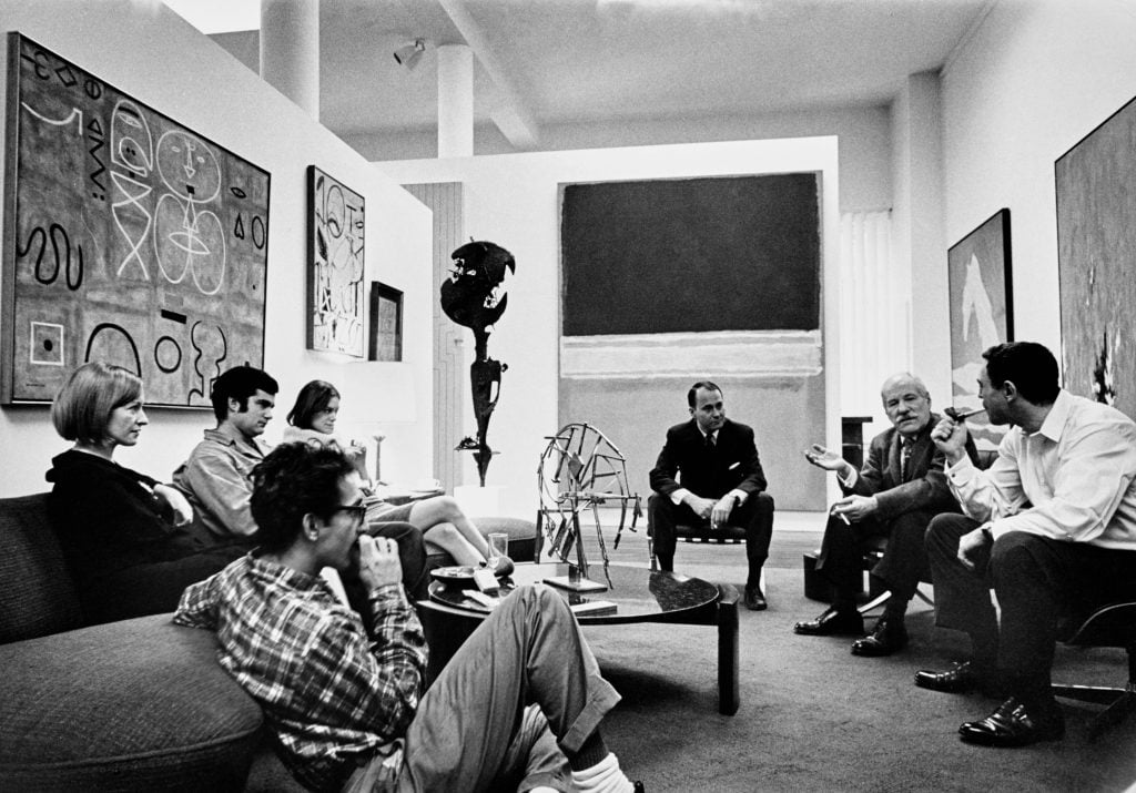 Barbara Rose, far left, with Larry Poons, Lucinda Childs, Wilder Green, Barnett Newman and William Rubin, in Rubin's apartment. Frank Stella, Rose's first husband, is in the foreground. Photo by William Grigsby/Condé Nast via Getty Images.