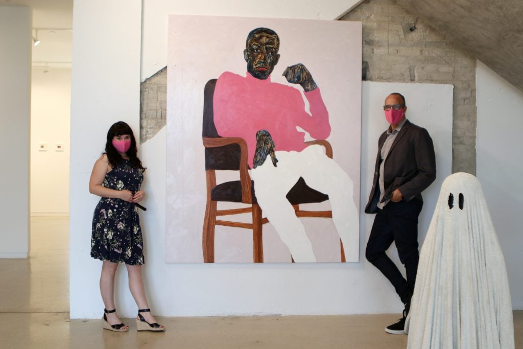 Laura Dvorkin and Maynard Monrow at the Bunker in West Palm Beach, with work by Amoako Boafo and Steve Hash. Photo by Michael Grogan.