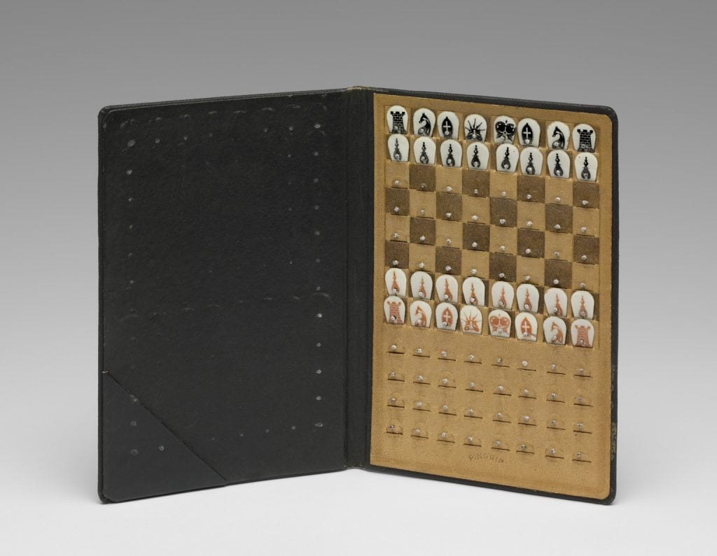Marcel Duchamp, Pocket Chess Set (1943). Leather, celluloid, and pins, 6 5/16 x 4 1/8 inches. © Artists Rights Society (ARS), New York / ADAGP, Paris / Succession Marcel Duchamp. The Louise and Walter Arensberg Collection, 1950. Image courtesy Philadelphia Museum of Art, 2020.