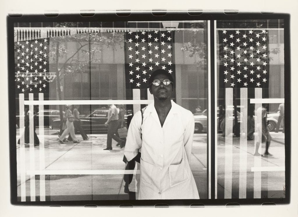 Ming Smith, <i>America seen through Stars and Stripes, New York City, New York </i> (ca. 1976). Courtesy of the Virginia Museum of Fine Arts. © Ming Smith.