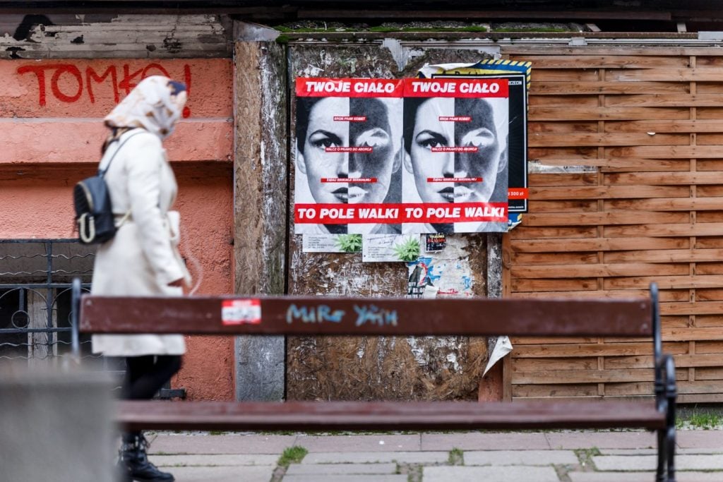 Barbara Kruger, <em>Your Body is a Battleground</em> (1989/1991) as seen on the streets of Szczecin, Poland. Photo by Andrzej Golc, courtesy of the artist, Sprüth Magers, Berlin, and the TRAFO Center for Contemporary Art, Szczecin. From the collection of the Ujazdowski Castle Center for Contemporary Art, Warsaw. 
