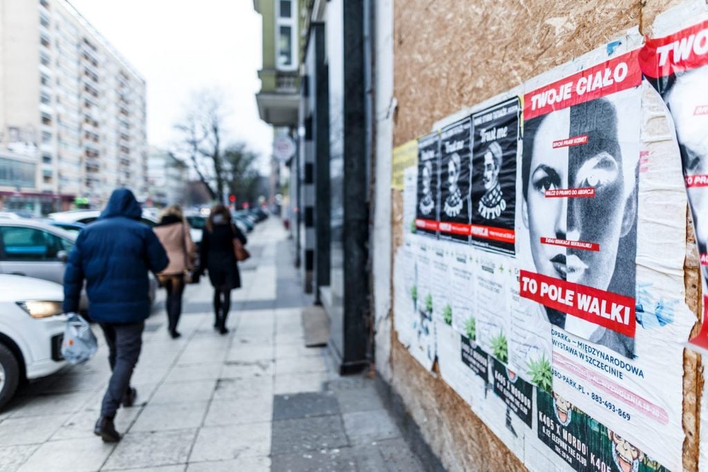 Barbara Kruger, <em>Your Body is a Battleground</em> (1989/1991) as seen on the streets of Szczecin, Poland. Photo by Andrzej Golc, courtesy of the artist, Sprüth Magers, Berlin, and the TRAFO Center for Contemporary Art, Szczecin. From the collection of the Ujazdowski Castle Center for Contemporary Art, Warsaw. 