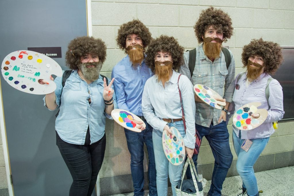 Cosplayers in character as The Joy of Painting TV star Bob Ross at MCM London Comic Con 2019 at ExCel on October 26, 2019 in London, England. (Photo by Ollie Millington/Getty Images.)