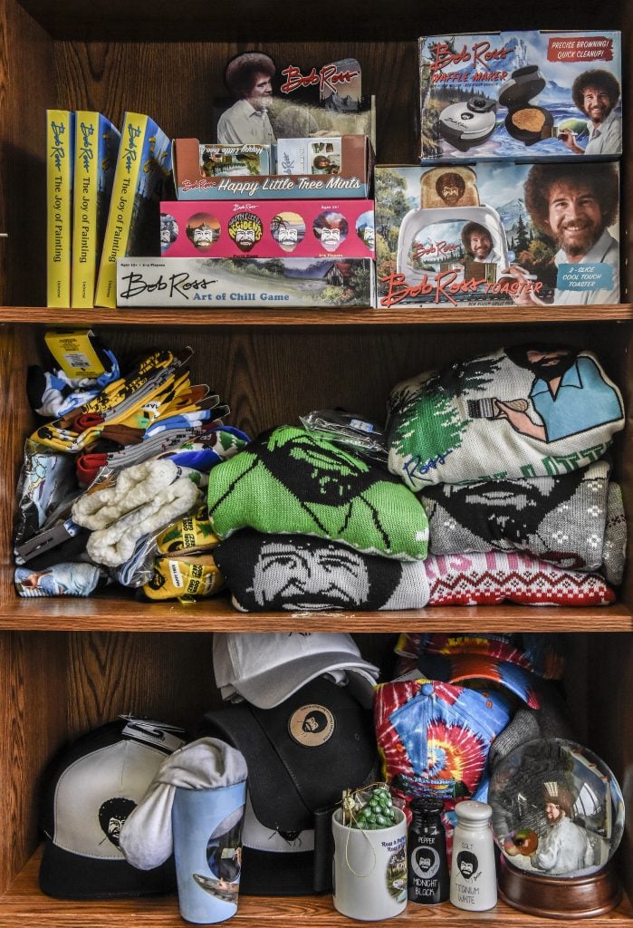 Merchandise at Bob Ross, Inc., the official structure behind the iconic PBS painting instructor, in Herndon, Virginia. (Photo by Bill O'Leary/The Washington Post via Getty Images.)