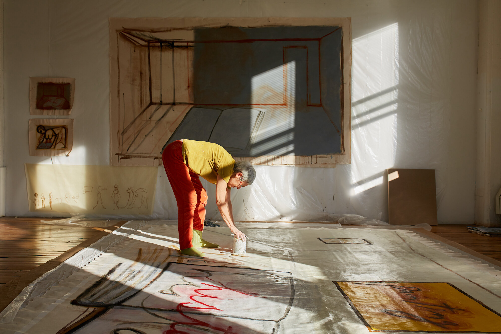 Mira Schor in her studio at Sharpe Walentas Studio Program. Photo by Brad Ogbonna, courtesy of Lyles & King.