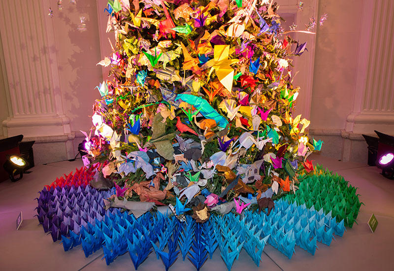 The "Cranes and Colors" Origami Holiday Tree at the American Museum of Natural History. Photo courtesy of the American Museum of Natural History. 
