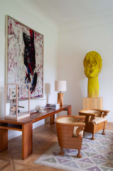 A Georg Baselitz sculpture and oil painting and a Tom Sachs skull sculpture in the collection of Thaddaeus Ropac.