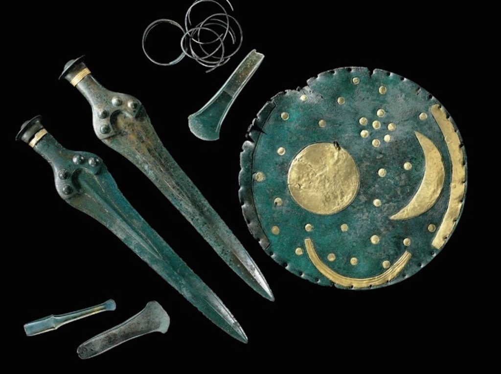 The controversial Nebra Sky Disk and some of the Bronze Age artifacts with which it was found. Photo courtesy of the State Museum for Prehistory in Halle, Germany. Photo by J. Lipták, Munich. 
