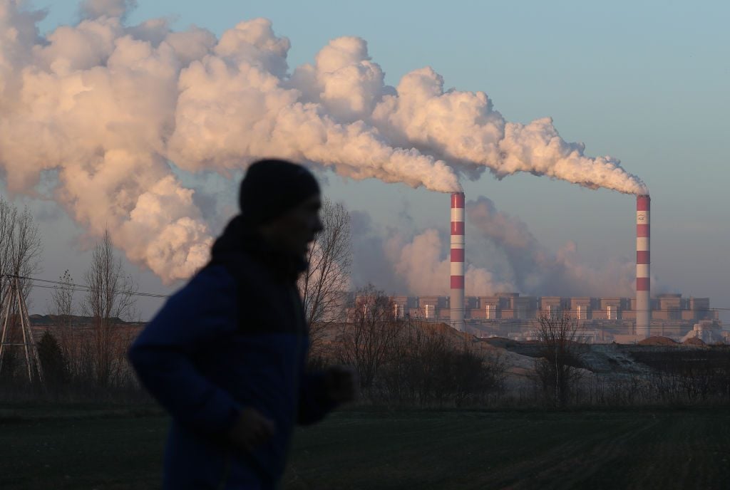 Steam and smoke rise from the Belchatow Power Station in Poland. Photo by Sean Gallup/Getty Images.