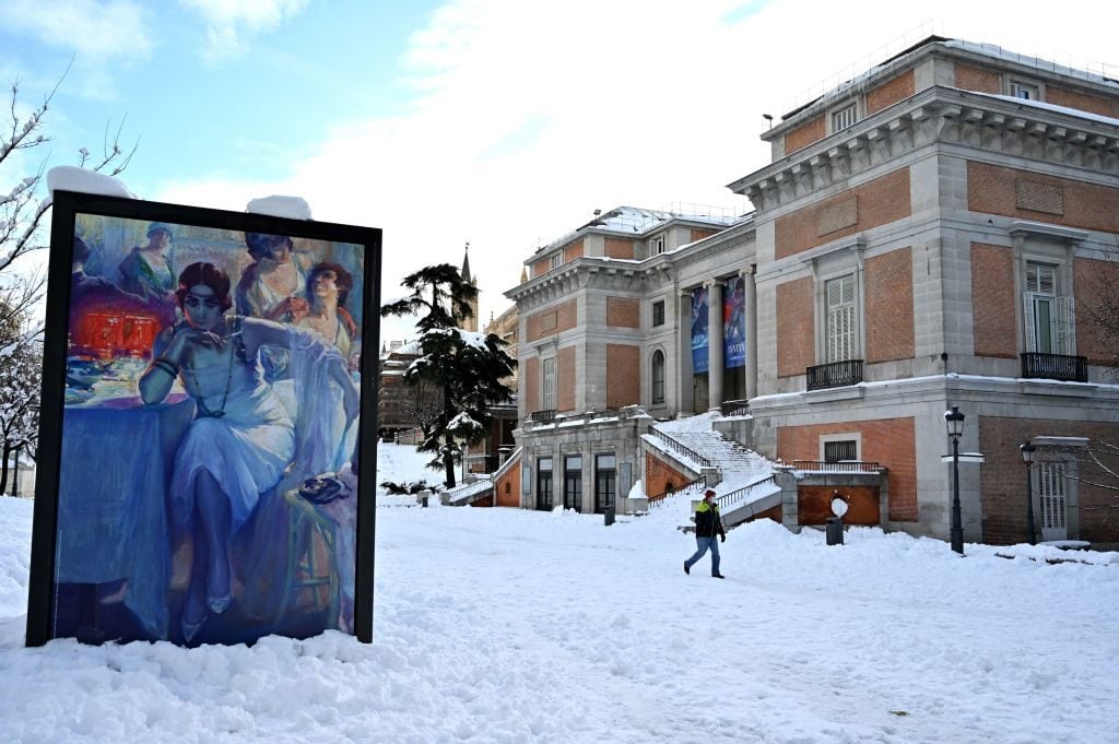 A man walks past the Prado Museum in Madrid on January 10, 2021. Photo by Gabriel Bouys/AFP via Getty Images.