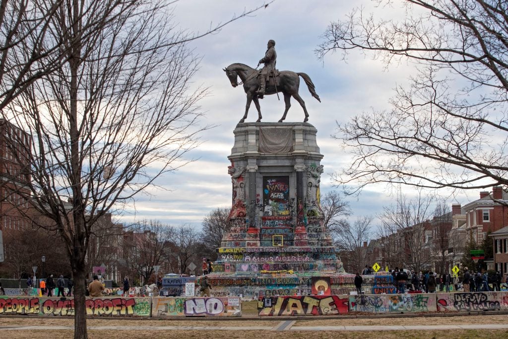 Black Lives Matter protestors defaced a Robert E. Lee statue in Richmond, Virginia. Photo by Ryan M. Kelly/AFP via Getty Images.