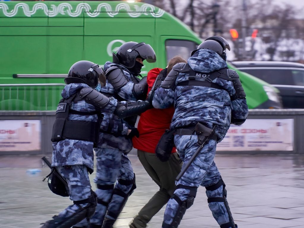 Police officers detain a protester during the demonstration. Rallies were held in the largest cities of Russia in support of the opposition leader Alexei Navalny, who was sent into custody after returning to Russia from Germany on suspicion of evading the control of the FSIN (Federal Penitentiary Service). The actions were accompanied by arrests on an unprecedented scale. Photo by Mihail Tokmakov/SOPA Images/LightRocket via Getty Images.